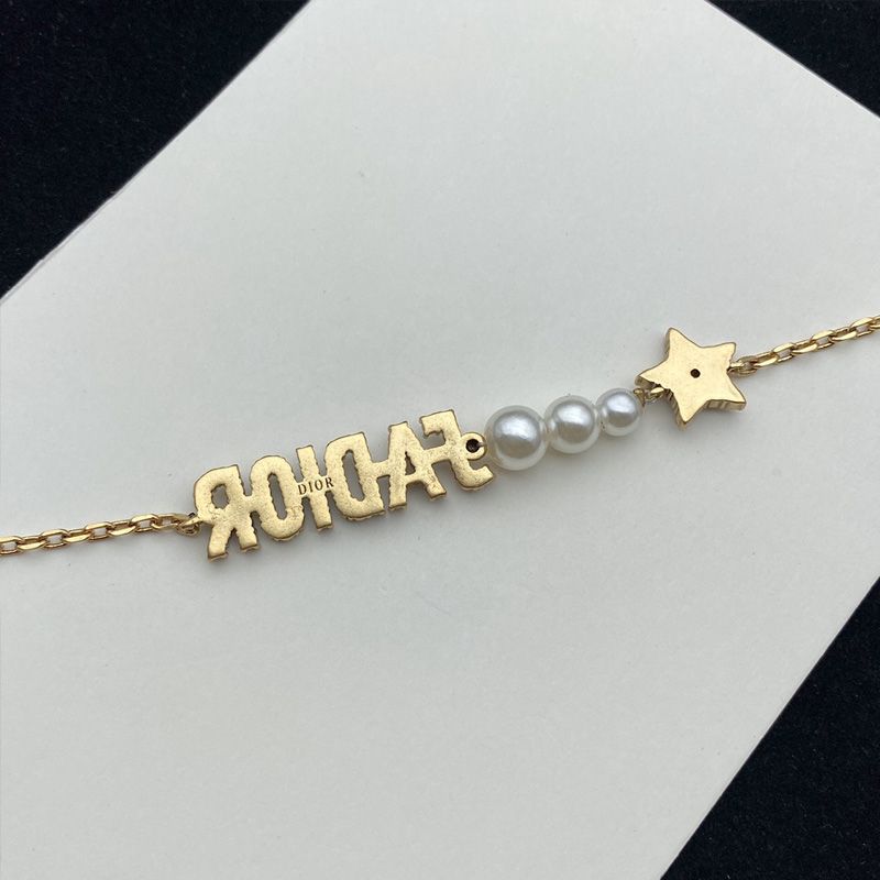 J'Adior Bracelet Metal with Resin Pearls, J'Adior and Star Charms Embellished Crystals Gold - Image 2