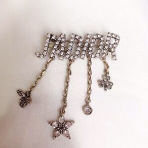 J'Adior Brooch Antique Metal with J'Adior Signature, Bee, Star, Clover Charms Embellished Crystals Gold